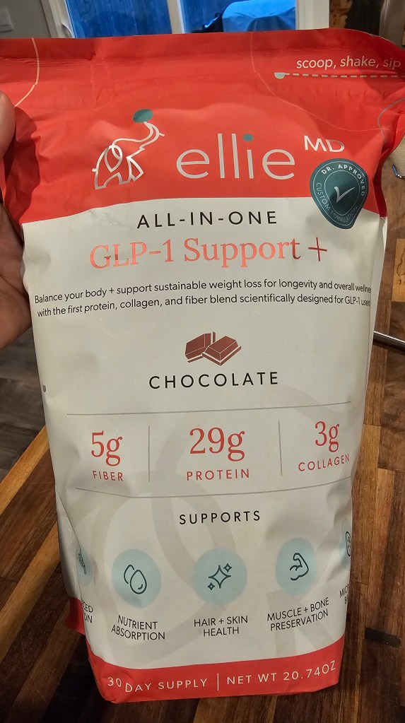 EllieMD All In One GLP-1 Support+ Protein powder in chocolate flavor. 5g Fiber, 29g Protein, 3g Collagen