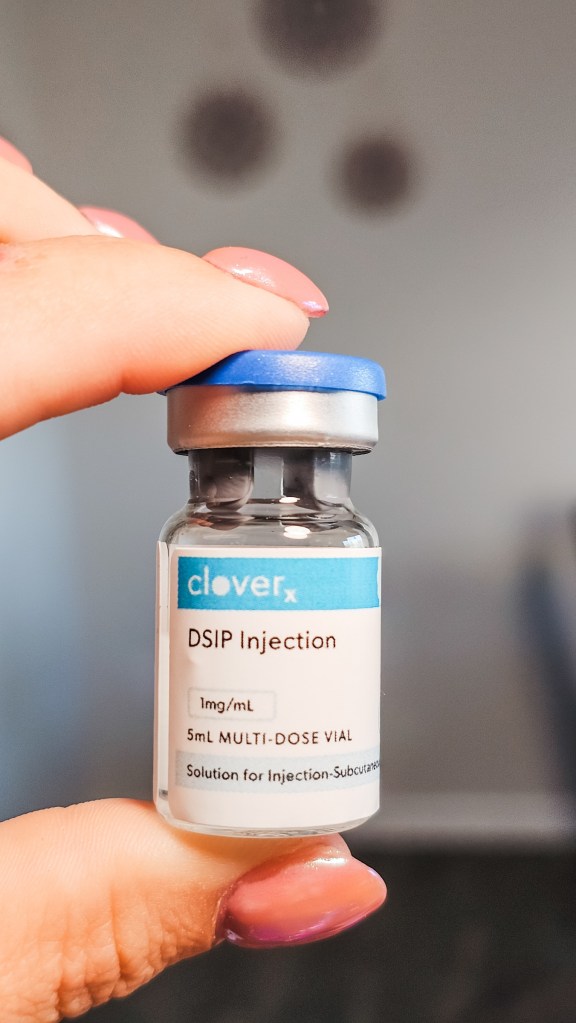 DSIP Delta Sleep-Inducing Peptide injection vial from Cloverx held in hand - 1mg/mL 5mL multi-dose